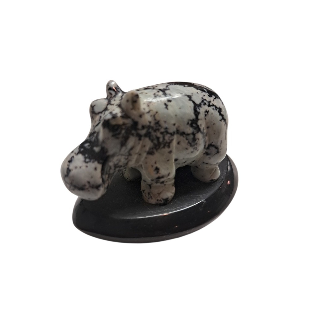 Small, hand-carved stone hippopotamus figurine